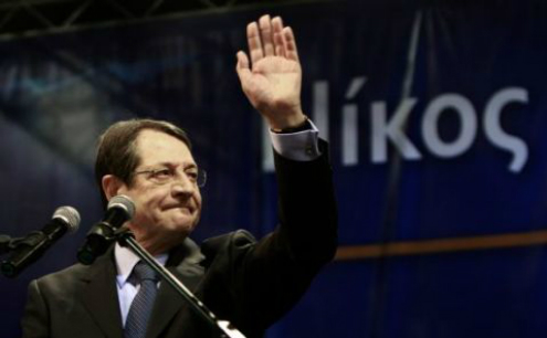 President Nicos Anastasiades re-elected and pledges call for unity